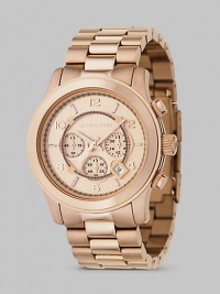 A slight twist to a classic chronograph timepiece in a rose goldplated stainless steel.Quartz movement Water resistant to 10 ATM Rose goldplated stainless steel round case, 45mm, (1.47) Rose chronograph dial Arabic numeral and index hour markers Date display between 4 and 5 o'clock Second hand Rose goldplated stainless steel bracelet Butterfly deployment buckle Imported A slight twist to a classic chronograph timepiece in a rose goldplated stainless steel.Quartz movement Water resistant to 10 ATM Rose goldplated stainless steel round case, 45mm, (1.47) Rose chronograph dial Arabic numeral and index hour markers Date display between 4 and 5 o'clock Second hand Rose goldplated stainless steel bracelet Butterfly deployment buckle Imported
