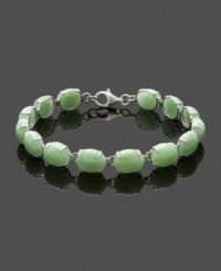 Uniqueness and a pale color palette combine in this beautiful bracelet. Crafted in sterling silver, oval-shaped jade links (8 mm x 10 mm) create a look of timeless elegance. Approximate length: 7-1/2 inches. Uniqueness and a pale color palette combine in this beautiful bracelet. Crafted in sterling silver, oval-shaped jade links (8 mm x 10 mm) create a look of timeless elegance. Approximate length: 7-1/2 inches.
