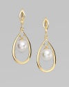 A round pearl dangles from a pretty 18k goldplated teardrop frame. 10mm round white organic man-made pearl 18k goldplated sterling silver Drop, about 1½ Ear wire Imported 