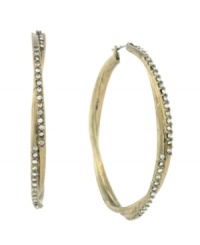 Time to add a little twist to your look. Jessica Simpson puts a modern spin on the traditional hoop earring with a chic, twisted design accented by sparkling crystals. Crafted in gold tone mixed metal. Approximate diameter: 2-1/4 inches. Time to add a little twist to your look. Jessica Simpson puts a modern spin on the traditional hoop earring with a chic, twisted design accented by sparkling crystals. Crafted in gold tone mixed metal. Approximate diameter: 2-1/4 inches.