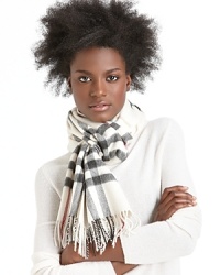 From Burberry, this familiar check will be a nice addition to your winter wear. In lusciously-soft cashmere and in an extra long length. From Burberry, this familiar check will be a nice addition to your winter wear. In lusciously-soft cashmere and in an extra long length.