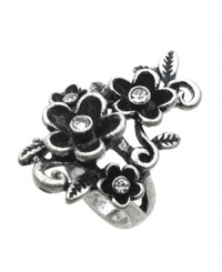 Spruce up your look for spring in sweet, sparkling blooms. GUESS ring features a triple flower design with round-cut crystal accents. Crafted in oxidized silver tone mixed metal. Size 7. Spruce up your look for spring in sweet, sparkling blooms. GUESS ring features a triple flower design with round-cut crystal accents. Crafted in oxidized silver tone mixed metal. Size 7.