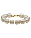From the island of Mallorca, Spain, this bracelet features white baroque organic man-made pearls (14 mm) with an 18k gold over sterling silver clasp. Approximate length: 7-1/2 inches.