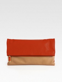 Chic colorblock leather defines this sleek foldover bag.Top zip closureOne inside open pocketCotton lining13½W X 6½H X 1/2DMade in Italy Chic colorblock leather defines this sleek foldover bag.Top zip closureOne inside open pocketCotton lining13½W X 6½H X 1/2DMade in Italy