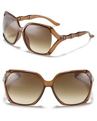 Bring a touch of the tropics to your accessories collection with these stunning Gucci sunglasses. The brand's signature bamboo motif makes for chic adornment. Bring a touch of the tropics to your accessories collection with these stunning Gucci sunglasses. The brand's signature bamboo motif makes for chic adornment.