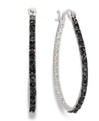 A practice in contrast. Victoria Townsend's shimmering hoops feature round-cut black diamonds (1/4 ct. t.w.) that pop against a sterling silver setting. Approximate diameter: 1 inch. A practice in contrast. Victoria Townsend's shimmering hoops feature round-cut black diamonds (1/4 ct. t.w.) that pop against a sterling silver setting. Approximate diameter: 1 inch.