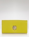 kate spade new york's ever-chic wallet gets prettier in luxurious leather with a bold turnlock closure. Equal parts practical and playful, it's perfect companion for purse or palm.