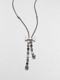 A long, graceful chain with an oxidized finish dangles a lariat of faceted stone strands, capped by a pretty bow.Glass and epoxy stonesOxidized rhodium finishLength, about 25Lobster claspImported A long, graceful chain with an oxidized finish dangles a lariat of faceted stone strands, capped by a pretty bow.Glass and epoxy stonesOxidized rhodium finishLength, about 25Lobster claspImported