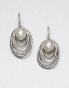 From the Pearl Crossover Collection. Round, lustrous pearls framed by iconic, sterling silver cable rings accented by dazzling diamonds. 8mm-8.5mm round white cultured pearlsSterling silverDiamonds, .09 tcwLever backImported 