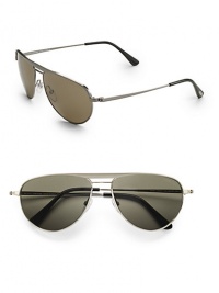 Sleek, lightweight metal frames are designed with double-bridge detail. Lens logo detail Made in Italy Sleek, lightweight metal frames are designed with double-bridge detail. Lens logo detail Made in Italy