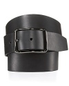 A dapper leather belt features an elongated buckle with a slight wave, bringing modern flair to this refined design.
