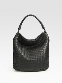 Signature Intrecciato weave of ultra supple nappa lambskin with a slouchy silhouette and smooth oval base.Top handle, 5 drop Magnetic top closure One inside zip pocket One inside cellphone slot Suede lining 14W X 13H X 5D Made in Italy Signature Intrecciato weave of ultra supple nappa lambskin with a slouchy silhouette and smooth oval base.Top handle, 5 drop Magnetic top closure One inside zip pocket One inside cellphone slot Suede lining 14W X 13H X 5D Made in Italy