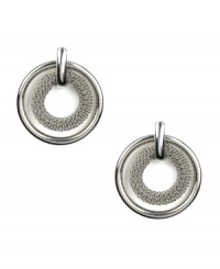 Simplicity and refinement in a simple stud setting. AK Anne Klein earrings feature two stacked circles in smooth and woven silver tone mixed metal. Approximate diameter: 1 inch. Simplicity and refinement in a simple stud setting. AK Anne Klein earrings feature two stacked circles in smooth and woven silver tone mixed metal. Approximate diameter: 1 inch.