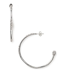 Melinda Maria's silver-plated hoops are a jewel box staple. Whether dressed down or to the nines, these versatile crystal-detailed earrings are designed to add instant glamour. Melinda Maria's silver-plated hoops are a jewel box staple. Whether dressed down or to the nines, these versatile crystal-detailed earrings are designed to add instant glamour.
