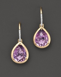 A beautiful faceted teardrop amethyst drop earrings in 14 Kt. yellow gold with diamond accents. A beautiful faceted teardrop amethyst drop earrings in 14 Kt. yellow gold with diamond accents.