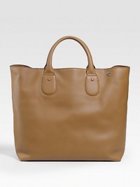 Leather tote with metal interlocking G detail. Double handles Dark nickel hardware Interior slip and zip pockets 19W X 16H X 8D Made in Italy Leather tote with metal interlocking G detail. Double handles Dark nickel hardware Interior slip and zip pockets 19W X 16H X 8D Made in Italy