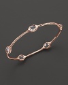 From the Rosé collection, five clear quartz stations on a hammered bangle. Designed by Ippolita.