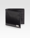 Sleek design in Italian leather with metal logo accent.Two billfold compartmentsEight card slotsLeather4¼W x 3¾HMade in Italy