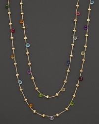 From the Paradise collection, a gold necklace with semi precious stones, designed by Marco Bicego. Shown doubled, but can be worn as one long strand too. From the Paradise collection, a gold necklace with semi precious stones, designed by Marco Bicego. Shown doubled, but can be worn as one long strand too.