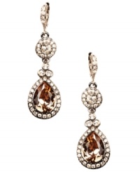 Smooth as silk, Givenchy's elegant earrings will add glamour to your evening attire. Crafted in brown gold-plated mixed metal, earrings are adorned with clear and topaz-colored glass accents. Approximate drop: 2-1/8 inches.