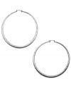 Amp it up, says RACHEL Rachel Roy! The bigger, the bolder, the better is always the way to go when it comes to hoop earrings. Crafted in silver tone mixed metal with a click backing. Approximate diameter: 3 inches.