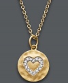 It's time to let love shine. Studio Silver's dazzling heart pendant features an imprinted crystal design set in 18k gold over sterling silver. Approximate length: 16 inches + 1-1/2-inch extender. Approximate drop: 3/4 inch.