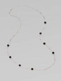 A long sterling silver chain with hammered bead and faceted onyx stations.Onyx Sterling silver Length, about 38 Lobster clasp closure Imported A long sterling silver chain with hammered bead and faceted onyx stations.Onyx Sterling silver Length, about 38 Lobster clasp closure Imported