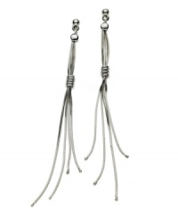 Whip up a style frenzy in these dramatic shoulder dusters. GUESS earrings feature four drop chains in a silver tone mixed metal post setting. Approximate drop: 3-1/2 inches. Whip up a style frenzy in these dramatic shoulder dusters. GUESS earrings feature four drop chains in a silver tone mixed metal post setting. Approximate drop: 3-1/2 inches.