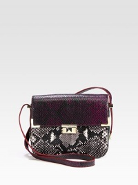 A chic python embossed leather style in a fun colorblock design with radiant hardware.Adjustable shoulder strap, 9½-13½ dropPush-lock flap closureThree inner compartmentsOne inside open pocketCotton lining8¾W X 7H X 2½DImported A chic python embossed leather style in a fun colorblock design with radiant hardware.Adjustable shoulder strap, 9½-13½ dropPush-lock flap closureThree inner compartmentsOne inside open pocketCotton lining8¾W X 7H X 2½DImported