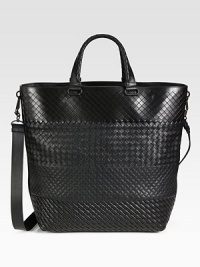 Iconic woven leather tote with adjustable shoulder strap for comfortable cross-body wear.Magnetic snap button closureTop handleAdjustable shoulder strapFully lined12¾W x 14½H x 6½DMade in Italy Iconic woven leather tote with adjustable shoulder strap for comfortable cross-body wear.Magnetic snap button closureTop handleAdjustable shoulder strapFully lined12¾W x 14½H x 6½DMade in Italy