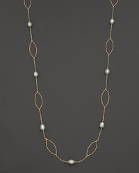 Freshwater pearls add rich luster to links of 14K yellow gold. By Nancy B. Freshwater pearls add rich luster to links of 14K yellow gold. By Nancy B.