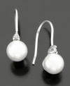 Delicate glass pearl earrings (6 mm) with a touch of cubic zirconia from Lauren Ralph Lauren are a year-round must-have. Silver-plated posts.