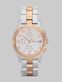 A classic chronograph dial with rose gold accents and bracelet link strap.Quartz movement Water resistant to 3 ATM Logo engraved rose gold bezel Light silver chronograph dial Arabic numeral hour markers Date display at 3 o'clock Second hand Stainless steel and rose gold link bracelet, 18mm, (.71) Imported A classic chronograph dial with rose gold accents and bracelet link strap.Quartz movement Water resistant to 3 ATM Logo engraved rose gold bezel Light silver chronograph dial Arabic numeral hour markers Date display at 3 o'clock Second hand Stainless steel and rose gold link bracelet, 18mm, (.71) Imported