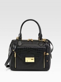 Beautiful pebbled leather accented with luxurious crocodile embossed leather and radiant hardware.Double top handles, 5½ dropDetachable adjustable shoulder strap, 21-22 dropTop zip closureProtective metal feetOne outside flap pocketOne inside zip pocketTwo inside open pocketsFully lined11½W X 9H X 6½DImported Beautiful pebbled leather accented with luxurious crocodile embossed leather and radiant hardware.Double top handles, 5½ dropDetachable adjustable shoulder strap, 21-22 dropTop zip closureProtective metal feetOne outside flap pocketOne inside zip pocketTwo inside open pocketsFully lined11½W X 9H X 6½DImported