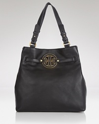 Highlight your daytime look with this large leather tote from Tory Burch. It's utterly effortless, simply slip your essentials inside for definitive daytime style. Highlight your daytime look with this large leather tote from Tory Burch. It's utterly effortless, simply slip your essentials inside for definitive daytime style.