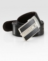 Logo engraved, palladium-plated buckle, accents this reversible leather design.LeatherAbout 1¼ wideMade in Italy