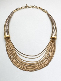 This unique statement piece features a mix of link and snake chains in a multi-row style with textured, horn-shaped endcaps. Antique-finished goldtoneLength, about 17Lobster clasp closureImported This unique statement piece features a mix of link and snake chains in a multi-row style with textured, horn-shaped endcaps. Antique-finished goldtoneLength, about 17Lobster clasp closureImported