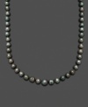 Channel the look of a Tahitian goddess. Belle de Mer's smooth strand of black cultured Tahitian pearls (8-9 mm) completes a look of rich opulence. Set in 14k gold. Approximate length: 18 inches.