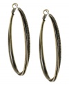 Add a stylish twist. The antique gold tone mixed metal setting on BCBGeneration's unique twisted hoop earrings give them a rustic look and feel. Approximate diameter: 2 inches.