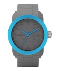 A sport watch with style, by Diesel. Gray faux link texture silicone bracelet and round gray plastic case, 44mm, with blue aluminum bezel. Matte gray dial features stick indices, minute track, large numerals at two, three and four o'clock, logo and three blue hands. Quartz movement. Water resistant to 30 meters. Two-year limited warranty. A sport watch with style, by Diesel. Gray faux link texture silicone bracelet and round gray plastic case, 44mm, with blue aluminum bezel. Matte gray dial features stick indices, minute track, large numerals at two, three and four o'clock, logo and three blue hands. Quartz movement. Water resistant to 30 meters. Two-year limited warranty.