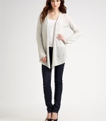 Ultra-soft cashmere shapes the body with and angular hem and bell sleeves. Dry clean or hand wash Imported
