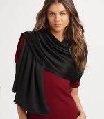 Hand-woven and hand-dyed cashmere/silk wrap reverses from a matte to a shine. Woven satin ball fringe 78L X 22W Imported