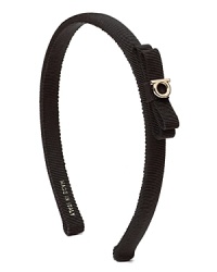Emanate classic ladylike style in this thin headband with signature grosgrain ribbon bow and gancini detail from Salvatore Ferragamo. Emanate classic ladylike style in this thin headband with signature grosgrain ribbon bow and gancini detail from Salvatore Ferragamo.