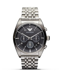 Designed for performance and style, this stainless steel watch from Emporio Armani is an exemplary choice. Features like its silver applied indexes and textured dial ensure commanding cool. Designed for performance and style, this stainless steel watch from Emporio Armani is an exemplary choice. Features like its silver applied indexes and textured dial ensure commanding cool.