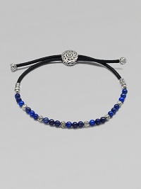 Lapis, lazuli and sterling silver beads accent this adjustable pull cord design.Sterling silverLapis & lazuliAdjustable pull cordAbout 4 diameterImported Lapis, lazuli and sterling silver beads accent this adjustable pull cord design.Sterling silverLapis & lazuliAdjustable pull cordAbout 4 diameterImported