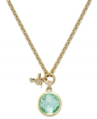 Hum a charming tune with this Juicy Couture charm necklace. A circular glass stone in shimmering green hues is paired with a hummingbird charm for a darling finishing touch. Crafted in gold tone mixed metal. Approximate length: 16 inches. Approximate drop: 1-1/2 inches. Hum a charming tune with this Juicy Couture charm necklace. A circular glass stone in shimmering green hues is paired with a hummingbird charm for a darling finishing touch. Crafted in gold tone mixed metal. Approximate length: 16 inches. Approximate drop: 1-1/2 inches.