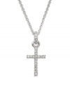 Give the gift of faith dusted with sparkling Swarovski crystal. This traditional cross pendant features round-cut crystal accents on the cross and bail. Crafted in silver tone mixed metal. Approximate length: 15-1/2 inches. Approximate drop: 1-1/2 inches.