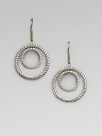 A circle of cabled sterling silver surrounds a sparkling pavé diamond-encrusted inner loop in these dangling earrings with a mobile-like design. Diamonds, 0.31 tcw Sterling silver Drop, about ¾ Ear wire Imported A circle of cabled sterling silver surrounds a sparkling pavé diamond-encrusted inner loop in these dangling earrings with a mobile-like design. Diamonds, 0.31 tcw Sterling silver Drop, about ¾ Ear wire Imported