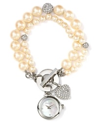 Carolee proves practicality can be pretty with this double strand pearl watch. With crystal beads and a delicate watch charm, it's a piece you'll wear now and treasure forever. Carolee proves practicality can be pretty with this double strand pearl watch. With crystal beads and a delicate watch charm, it's a piece you'll wear now and treasure forever.