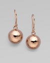 Glowing hammered spheres are both classic and modern, in sterling silver and 18k gold, finished in rich, warm 18k rose goldplating.18k gold and sterling silver with 18k rose goldplatingDrop, about 1Ear wireImported